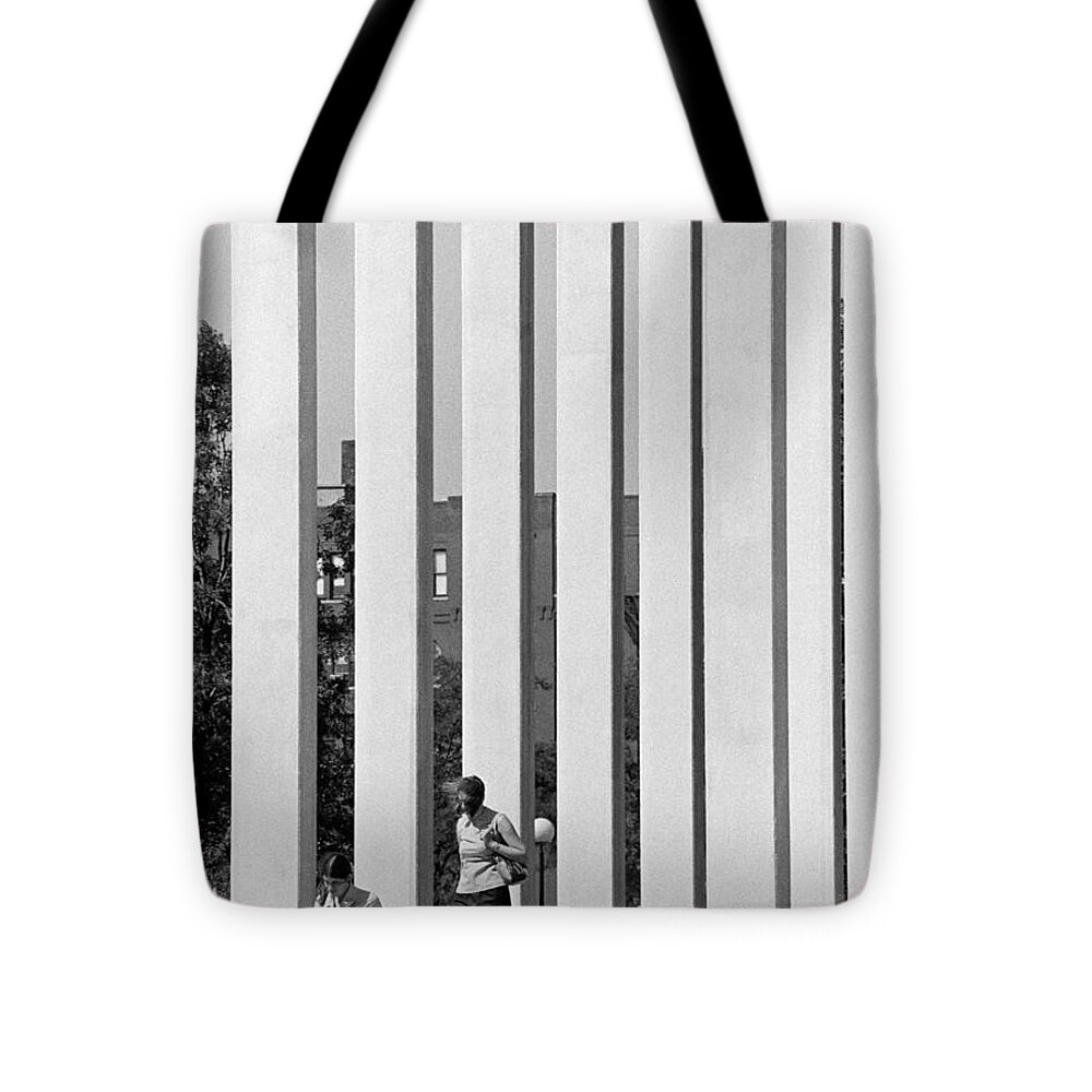 Actions Tote Bag featuring the photograph Northwestern National Life columns by Mike Evangelist