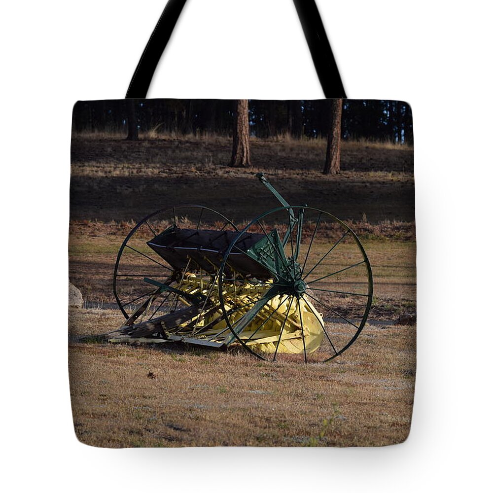 Green Tote Bag featuring the photograph Old Farm Implement Lake George CO by Margarethe Binkley