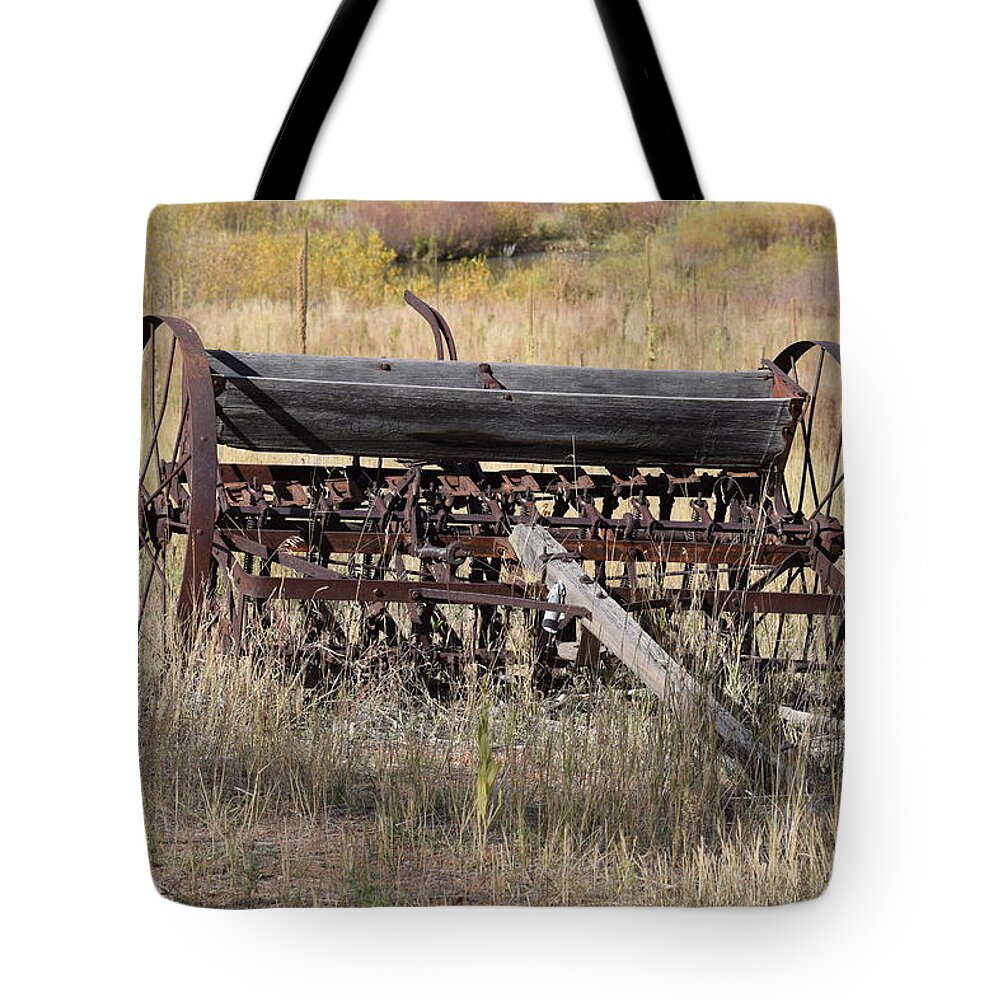 Old Tote Bag featuring the photograph Farm Implament Westcliffe CO by Margarethe Binkley