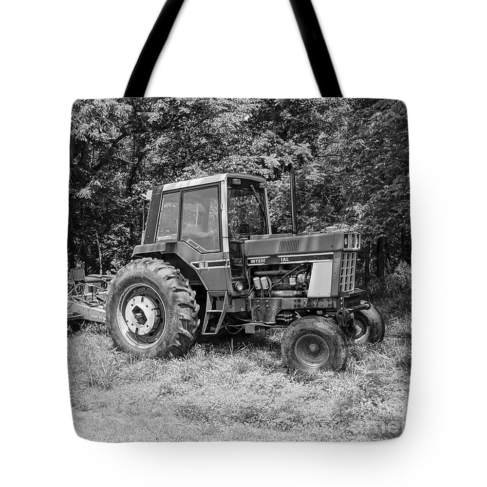Tractor Tote Bag featuring the photograph Old International Tractor Grayscale by Jennifer White