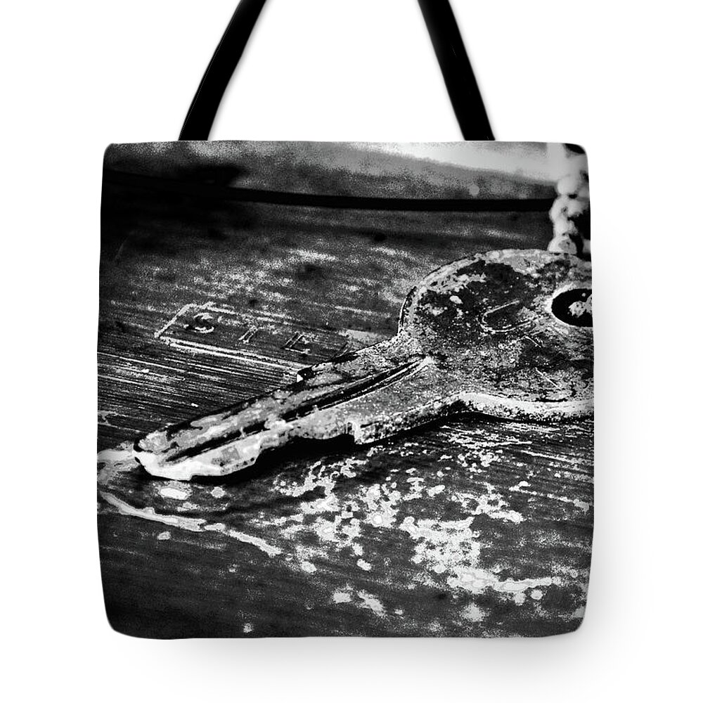 Key Tote Bag featuring the photograph Old Key by Susan Cliett