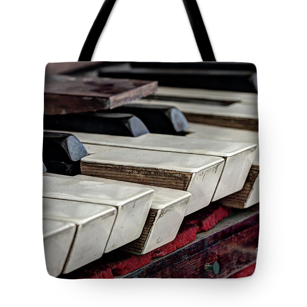 Keyboard Tote Bag featuring the photograph Old organ keys by Michal Boubin