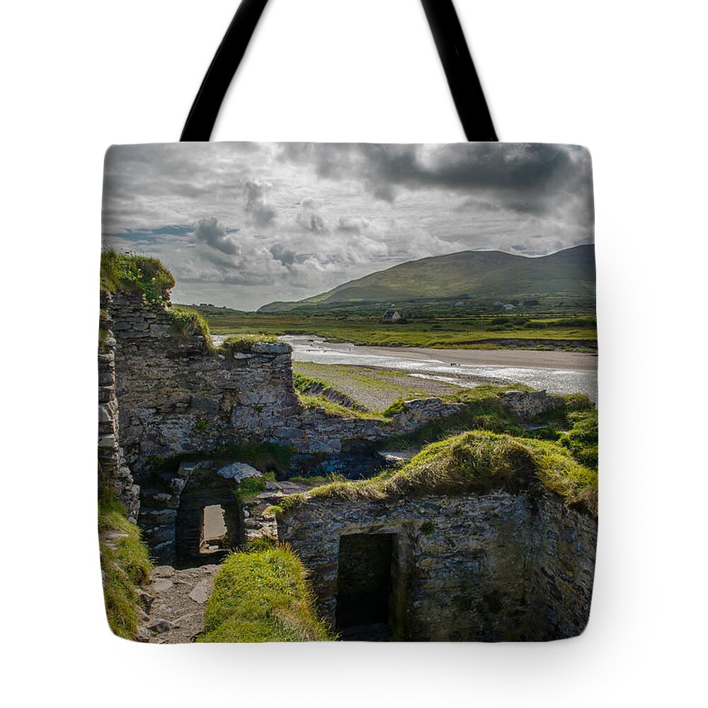 Castle Tote Bag featuring the photograph Old Stone Fortress at the Coast of Ireland by Andreas Berthold