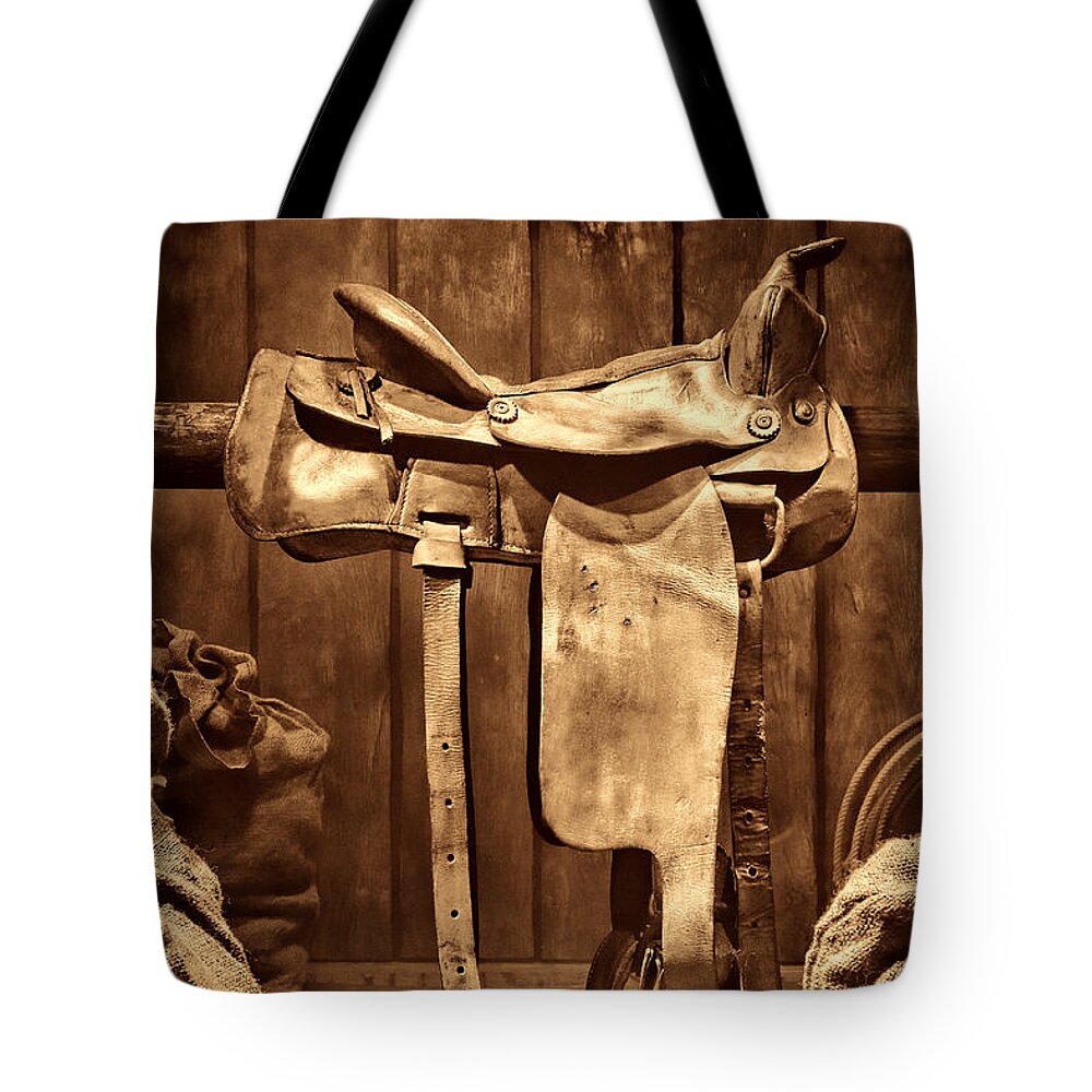 Saddle Tote Bag featuring the photograph Old Western Saddle by American West Legend By Olivier Le Queinec