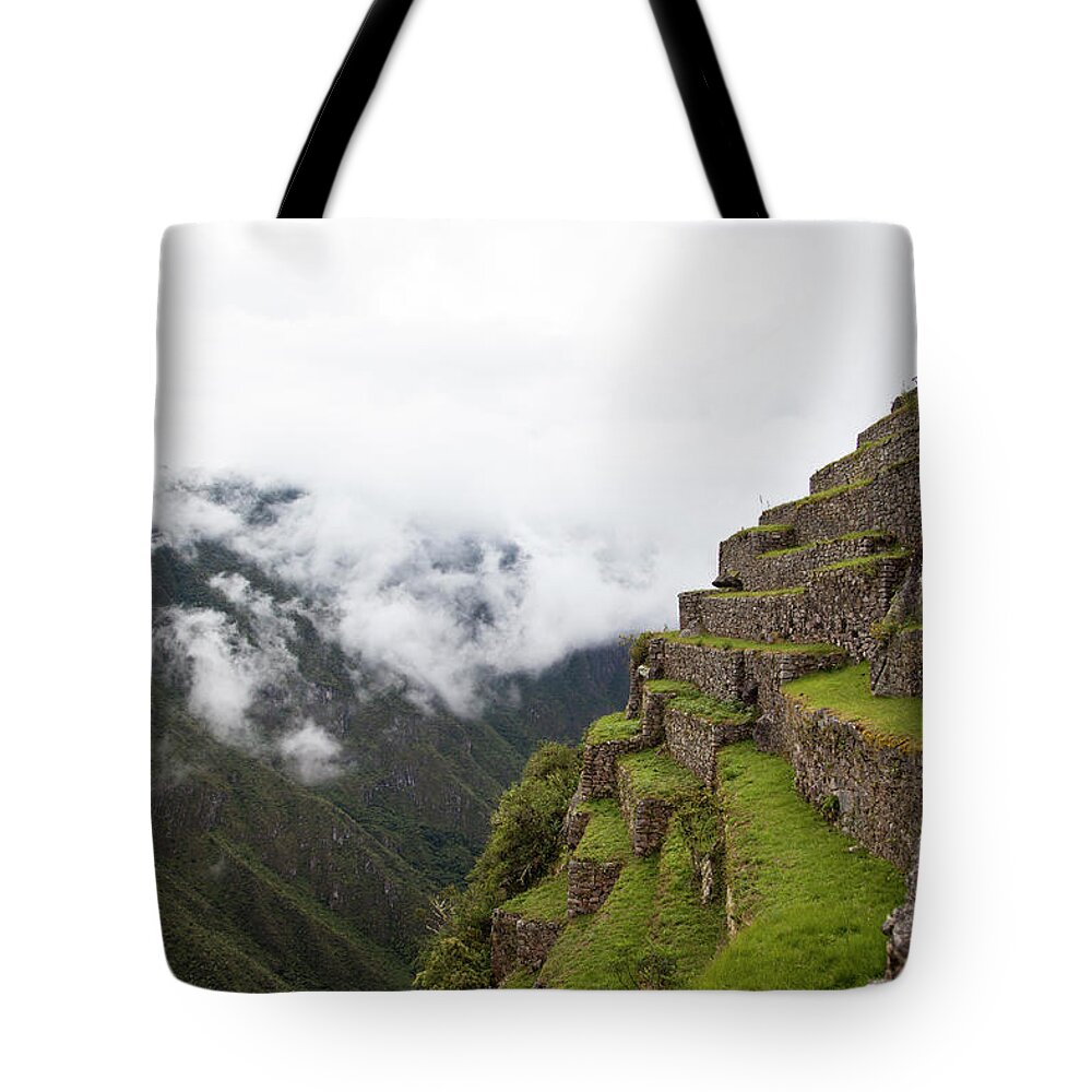 Machu Picchu Tote Bag featuring the photograph On the Edge by Timothy Johnson