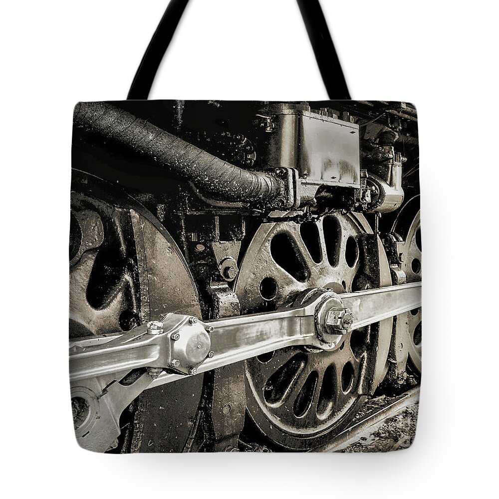 Railroads Tote Bag featuring the photograph On The Rails by John Anderson