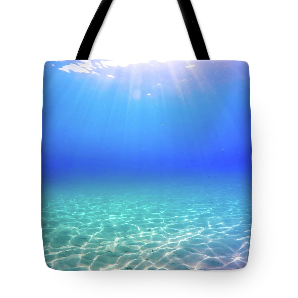 Turquoise Tote Bag featuring the photograph One Deep Breath by Nicklas Gustafsson