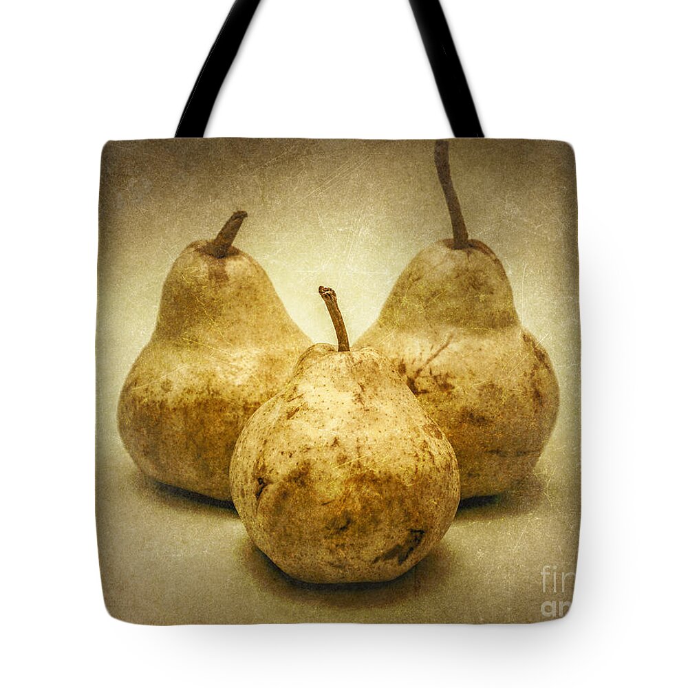 Pear Tote Bag featuring the photograph One Pair Too Many by Jorgo Photography