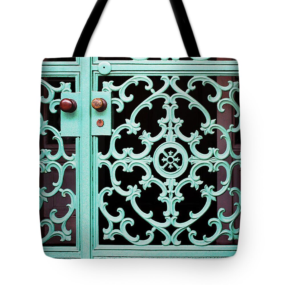 Architecture Tote Bag featuring the photograph Ornate Doors by Todd Blanchard