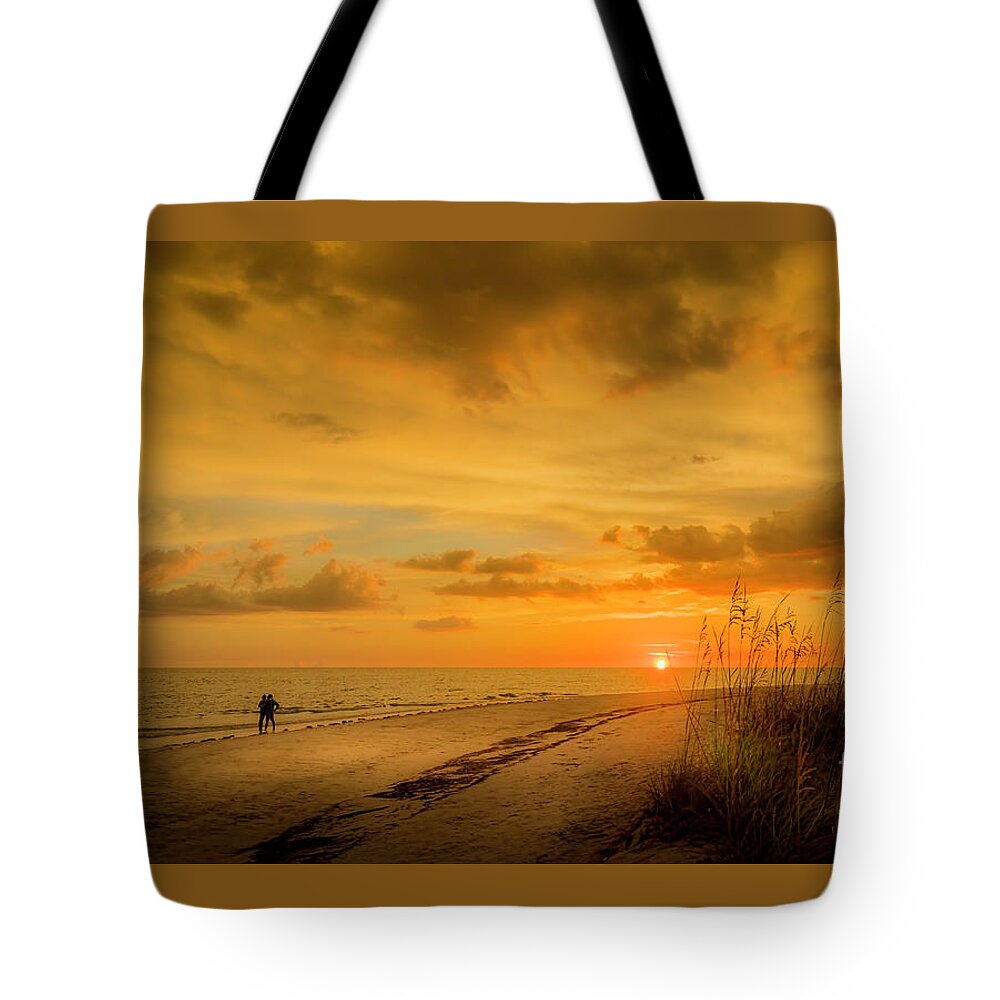 Sunset Tote Bag featuring the photograph Our Happy Place In The Sun by Marvin Spates