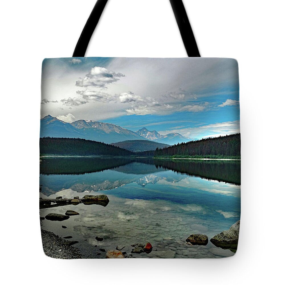 Patricia Lake Tote Bag featuring the photograph Patricia Lake Reflection with Red Canoe by David T Wilkinson