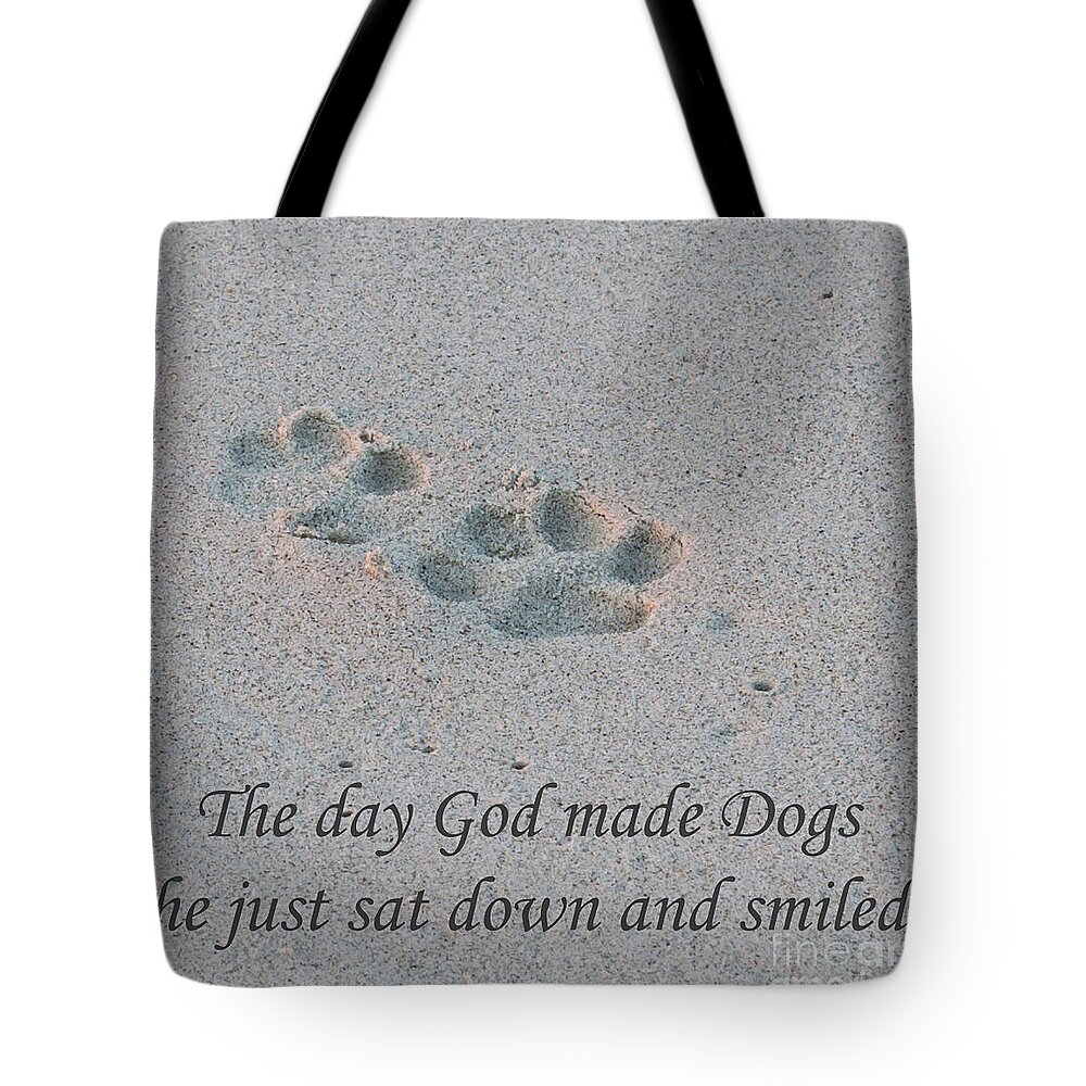 Paw Prints Tote Bag featuring the photograph Paw Prints by Dale Powell
