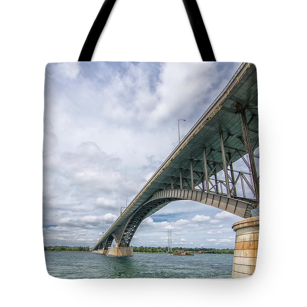 Bridge Tote Bag featuring the photograph Peace Bridge by Deborah Ritch