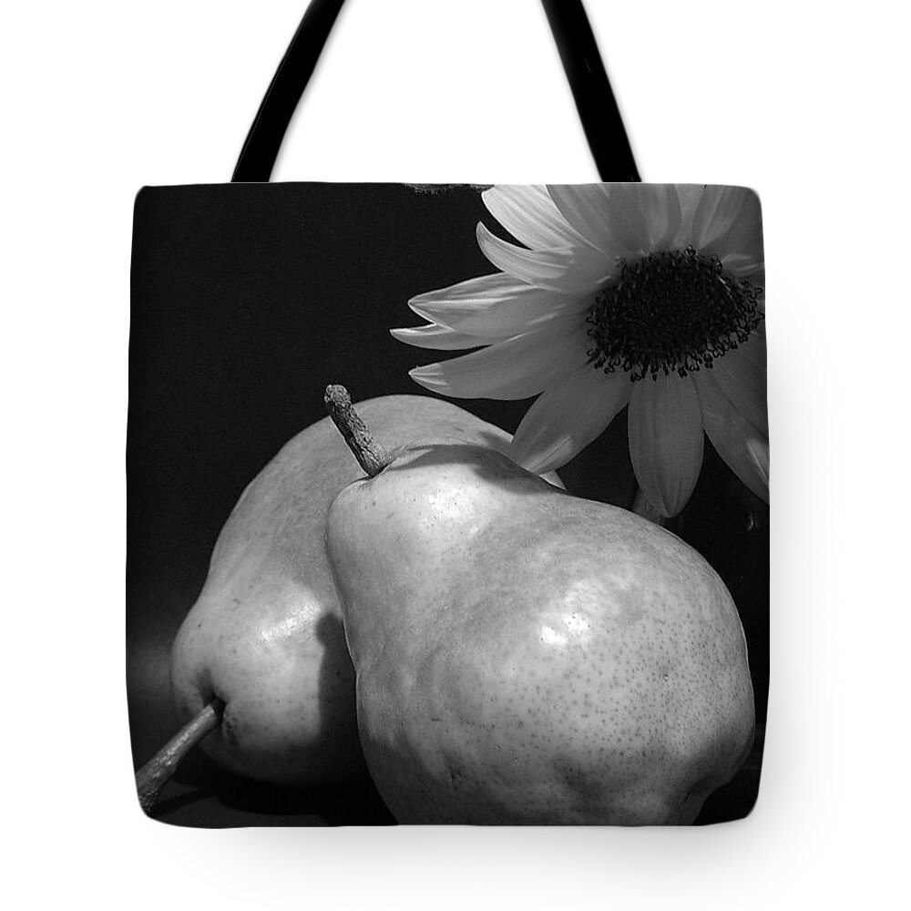 Black And White Tote Bag featuring the photograph Pears in the sun by Thomas Pipia