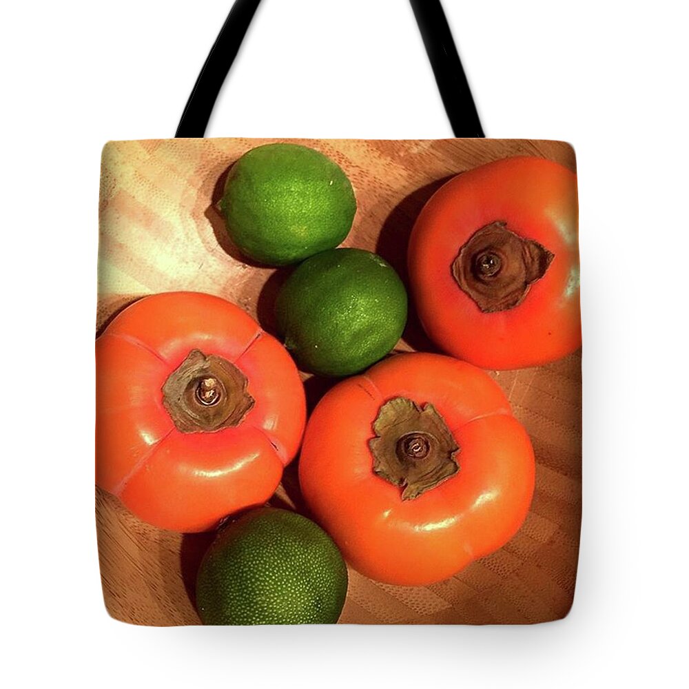 Circles Tote Bag featuring the photograph Persimmons And Limes. Complementary by Ginger Oppenheimer