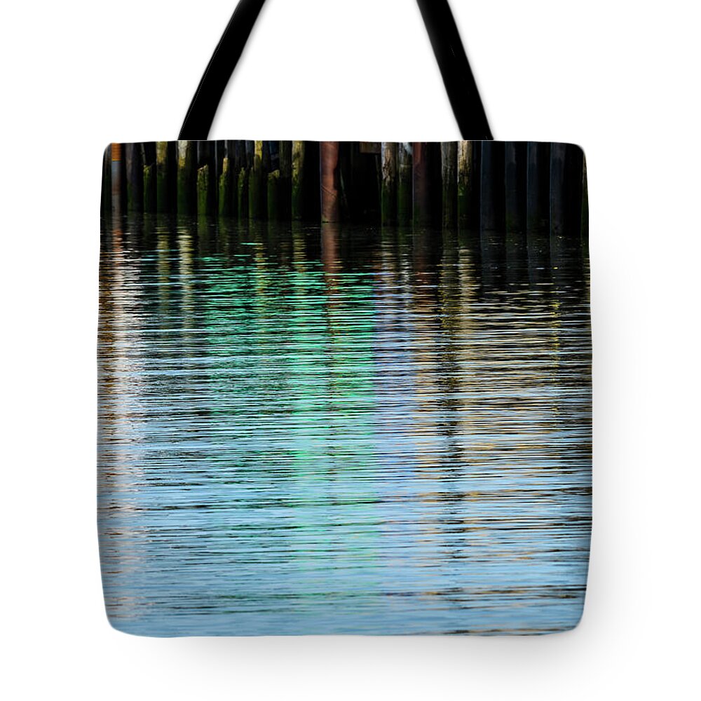 Abstract Tote Bag featuring the photograph Pier Reflections by Robert Potts