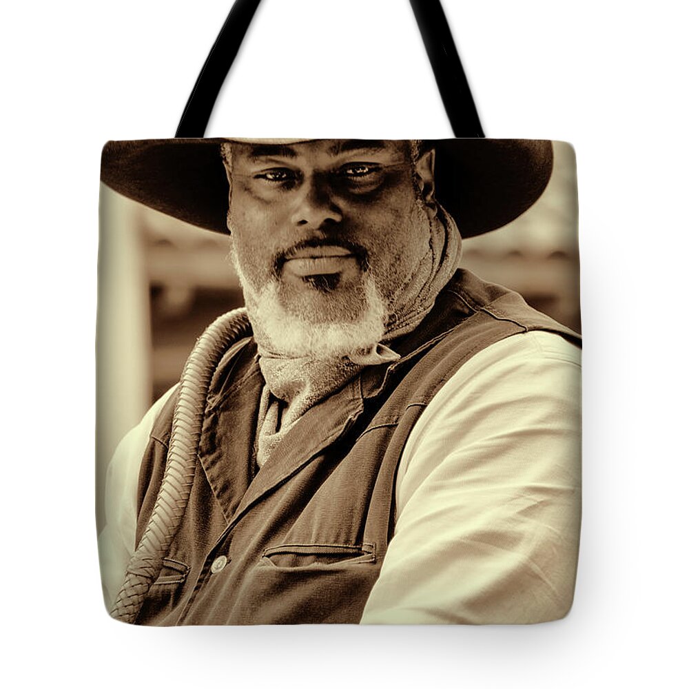 Cowboy Hat Tote Bag featuring the photograph Piercing Eyes of the Cowboy by Jeanne May