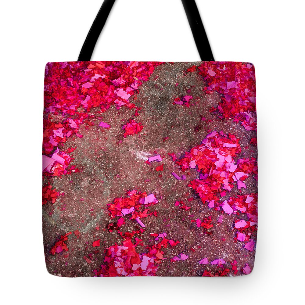 Bonnie Follett Tote Bag featuring the photograph Pink and Red Firecracker Debris Abstract by Bonnie Follett
