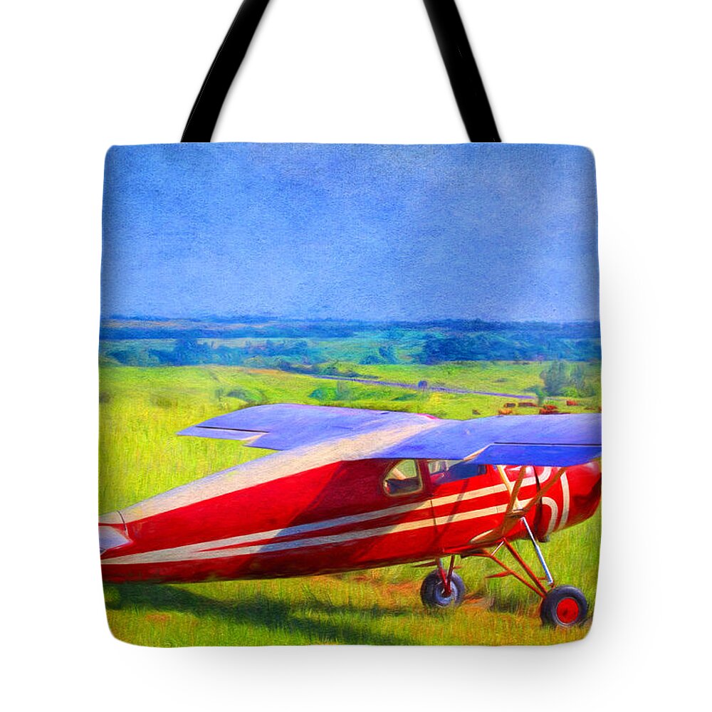 Piper Cub Tote Bag featuring the photograph Piper Cub Airplane in Kansas Prairie by Anna Louise