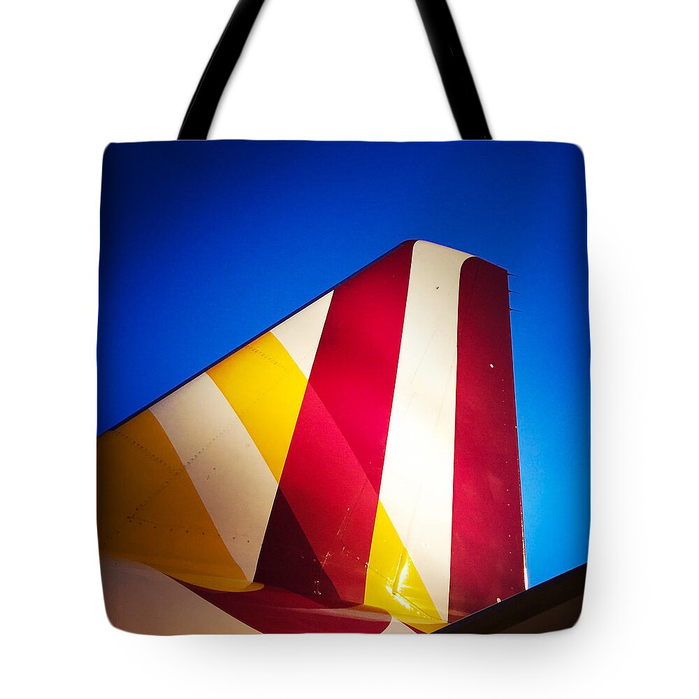 Plane Tote Bag featuring the photograph Plane abstract red yellow blue by Matthias Hauser