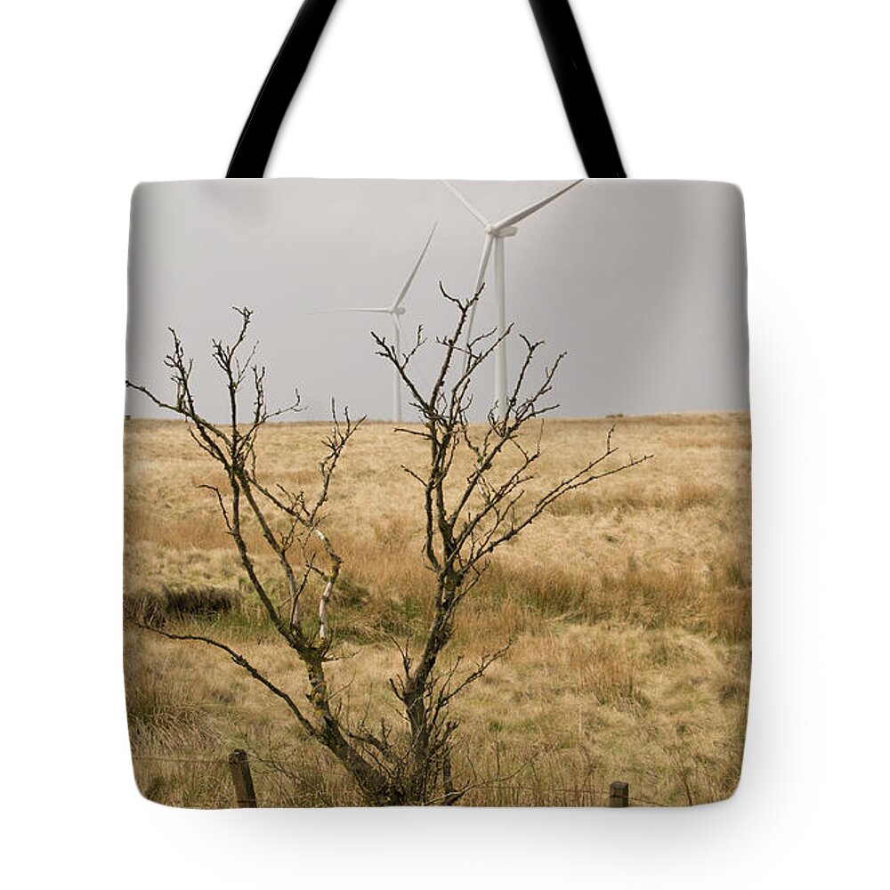 Windmill Tote Bag featuring the photograph Planted. by Elena Perelman