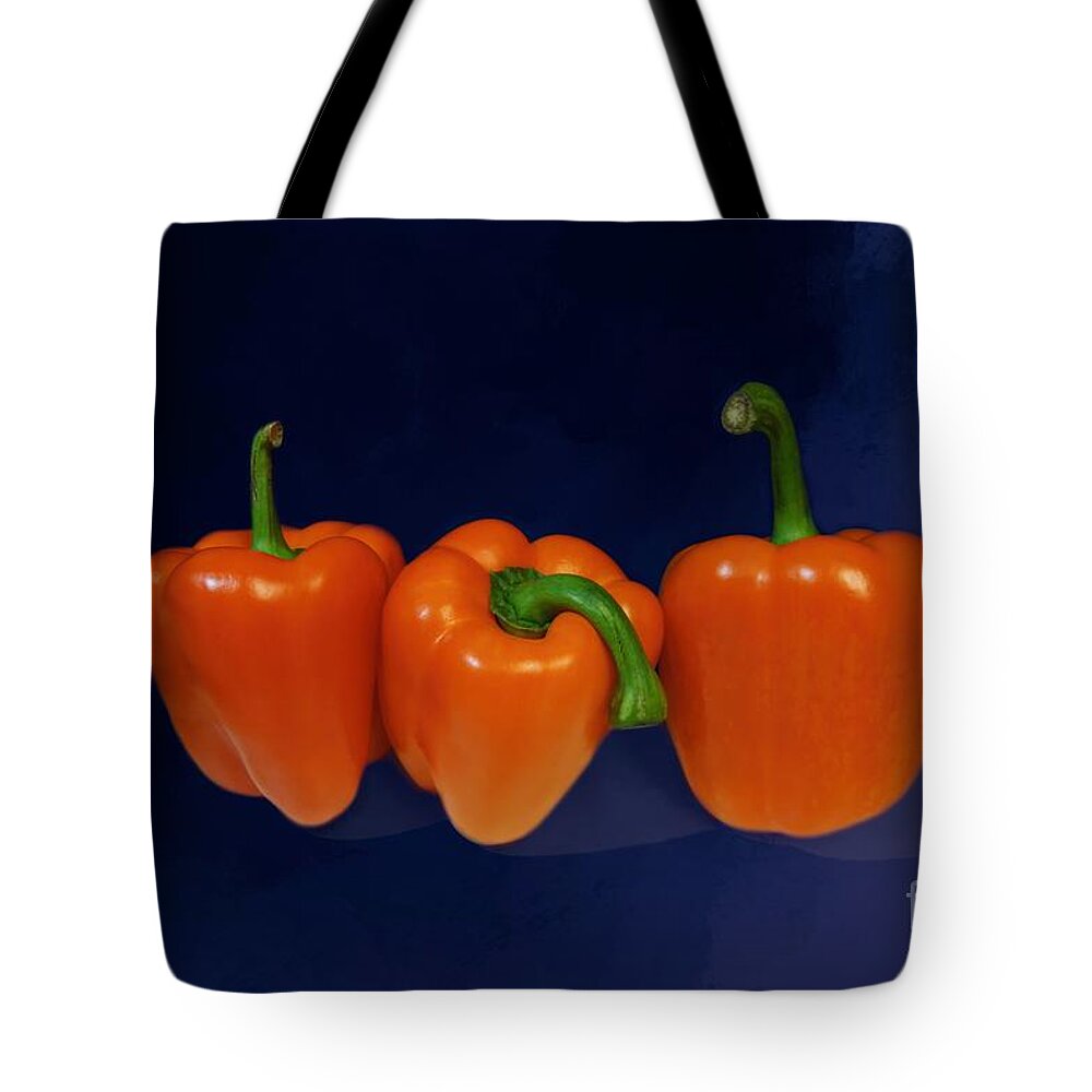 Playful Tote Bag featuring the photograph Playful Peppers by Renee Trenholm