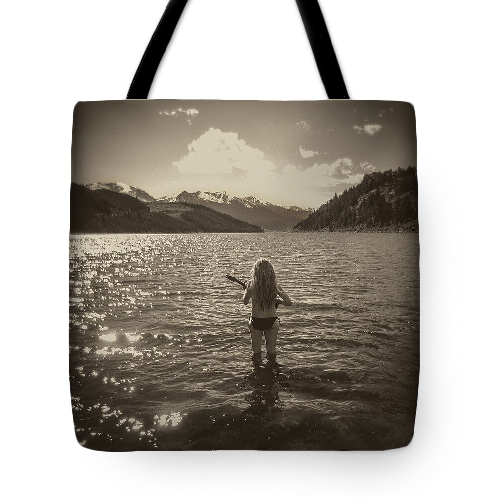 Mountains Tote Bag featuring the photograph Playing to the mountains by Matthew Lit