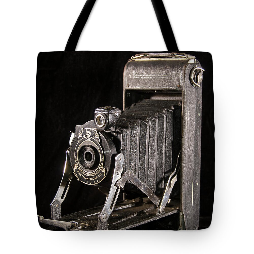 1926 Tote Bag featuring the photograph Pocket Kodak Series II by Michael Peychich