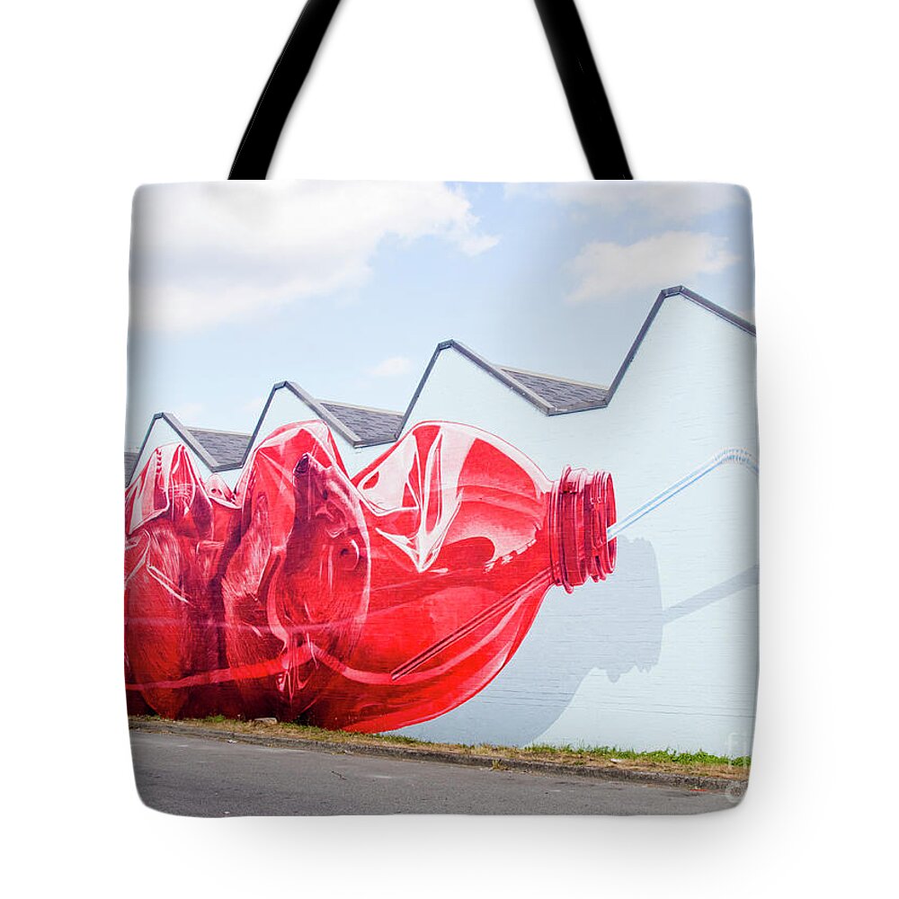 Christian Rebecchi Tote Bag featuring the photograph Polar Bear in a Coke Bottle by Chris Dutton