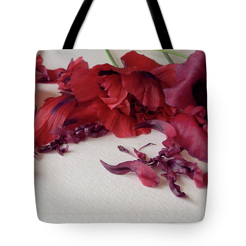Poppies Tote Bag featuring the photograph Poppies Petals by Kim Tran