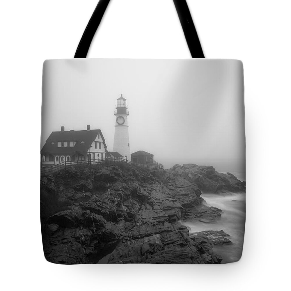 Vacationland Tote Bag featuring the photograph Portland Head Lighthouse in fog Black and White by David Smith
