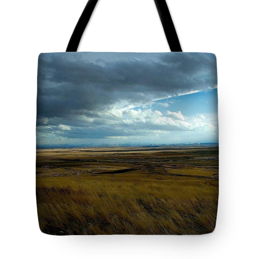 Prairie Storm Tote Bag featuring the photograph Prairie Storm by Tracey Vivar