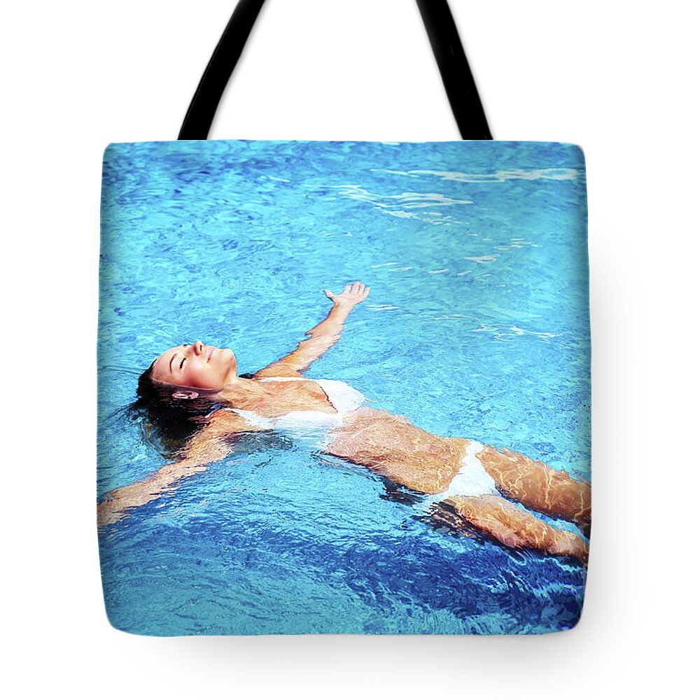 Activity Tote Bag featuring the photograph Pretty girl in swimming pool by Anna Om