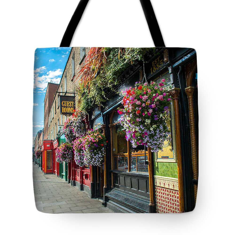 Ireland Tote Bag featuring the photograph Pub in Dublin in Ireland by Andreas Berthold
