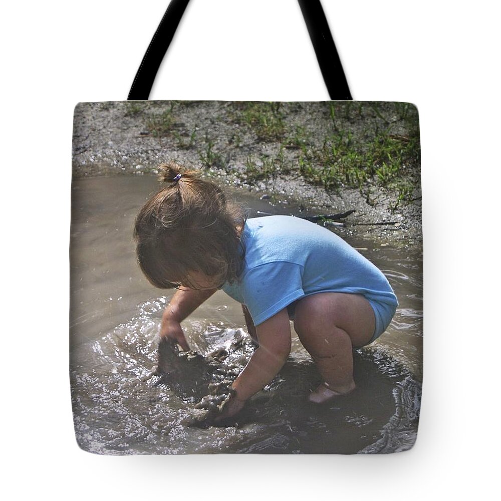 Kids Tote Bag featuring the photograph Puddles and kids by Dodie Ulery