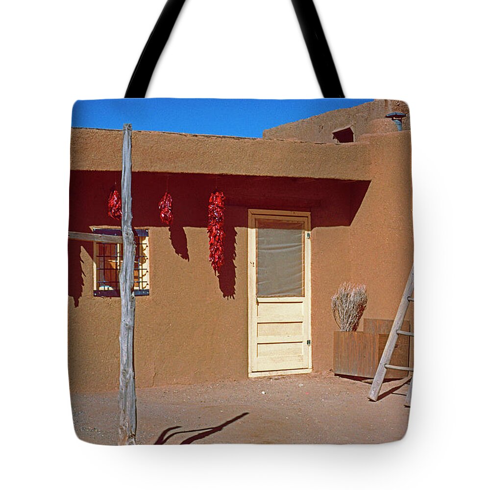 American Southwest Tote Bag featuring the photograph Pueblo Home With Yellow Door by Ira Marcus