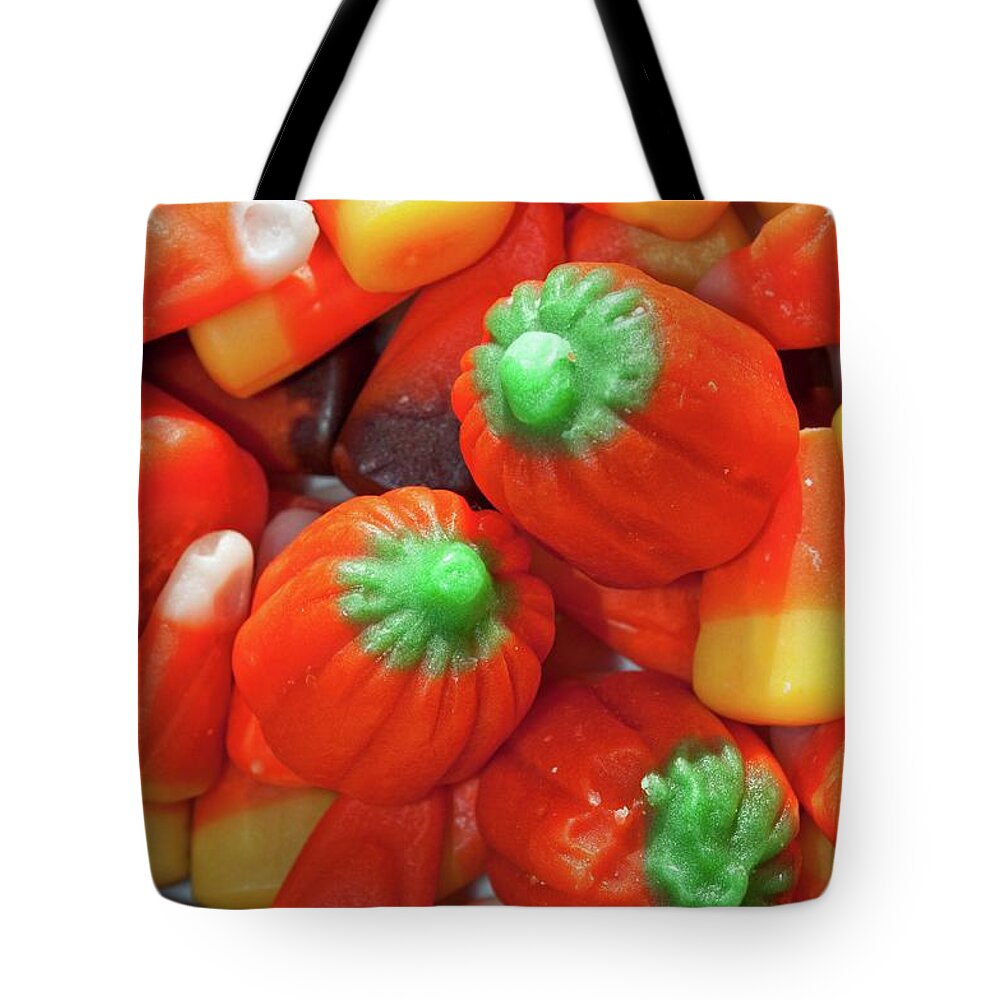 Halloween Tote Bag featuring the photograph Pumpkins and Candy Corn by Cathy Mahnke