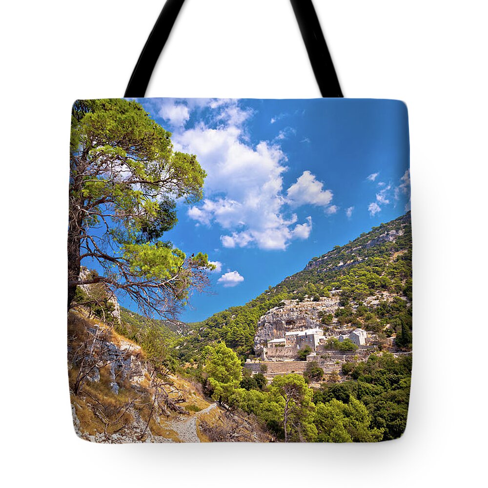 Brac Tote Bag featuring the photograph Pustinja Blaca canyon hermitage on Brac island by Brch Photography