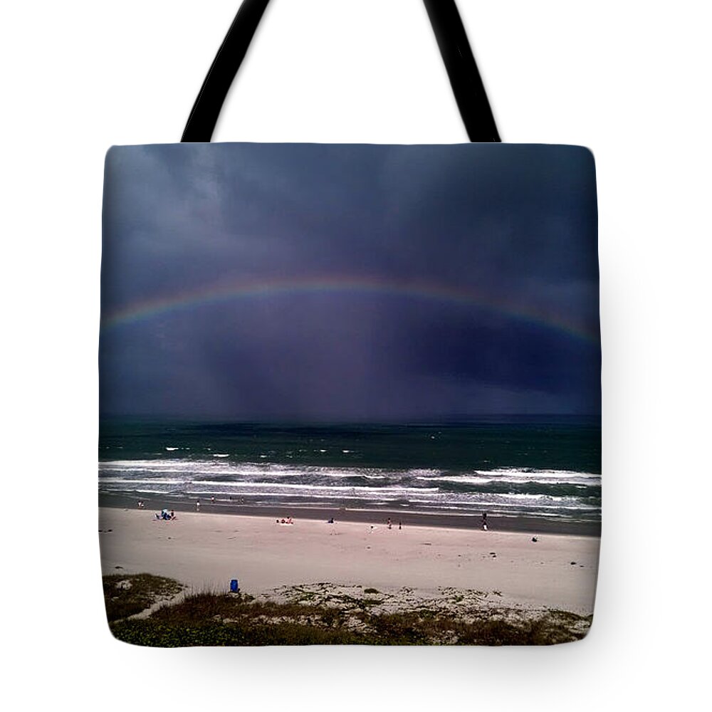 Rainbow Tote Bag featuring the photograph Rainbow Near The Shore by David Weeks