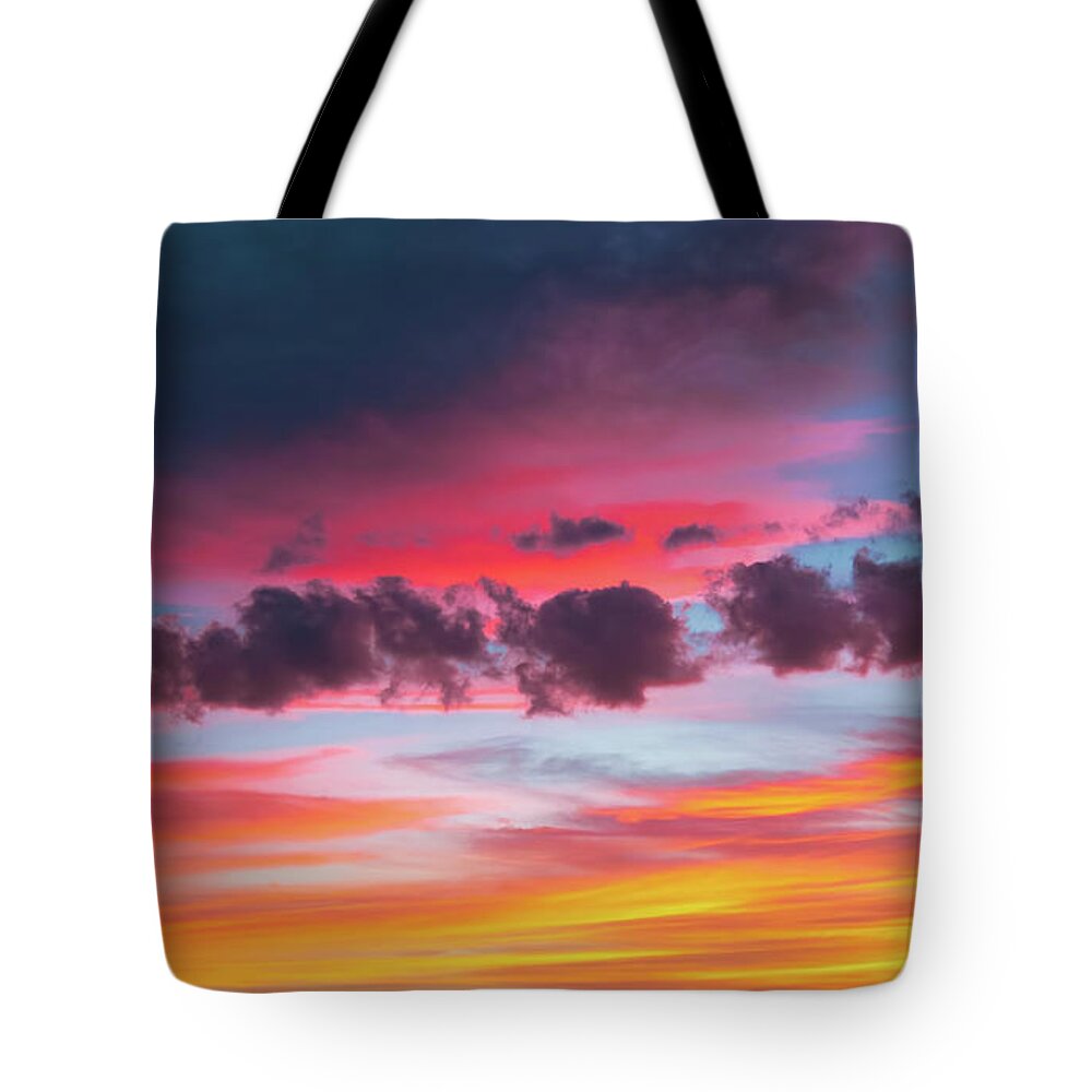 Sunset Tote Bag featuring the photograph Rainbow Sunset by Richard Goldman