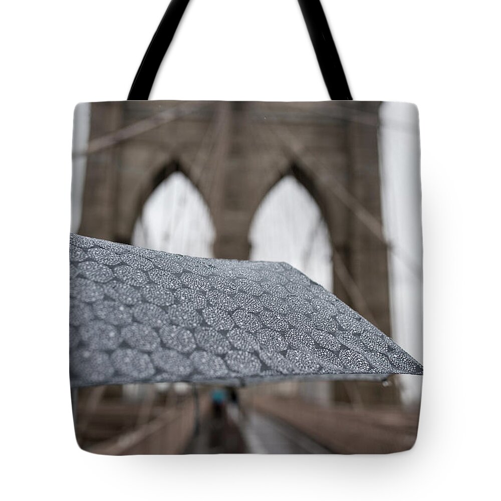 Brooklyn Tote Bag featuring the photograph Rainy Day on the Brooklyn Bridge Brooklyn New York Cables Umbrella by Toby McGuire