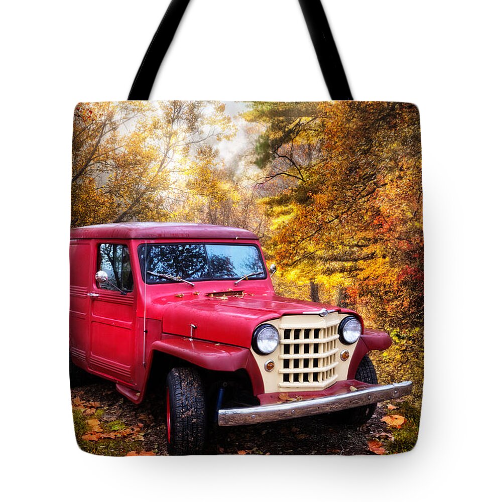 1950 Tote Bag featuring the photograph Red 1951 Jeep by Debra and Dave Vanderlaan