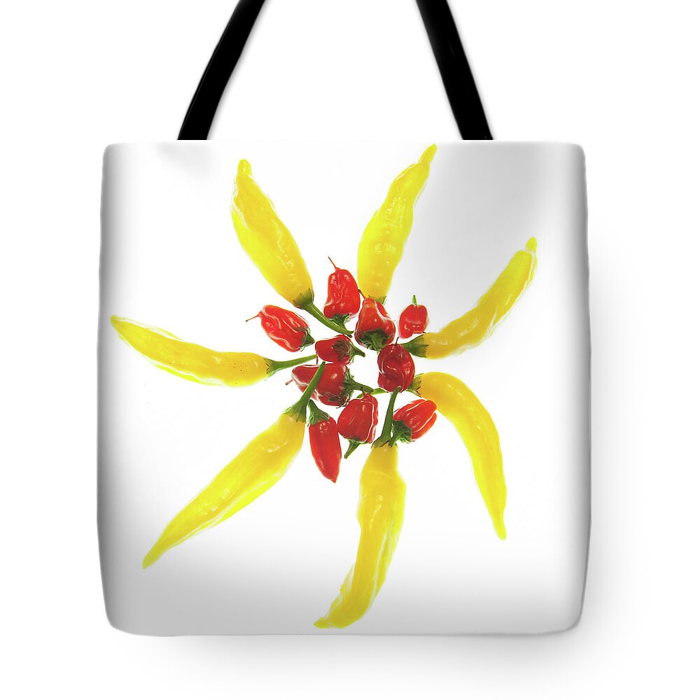 Chilies Tote Bag featuring the photograph Red and Yellow Chillie Star by Helen Jackson