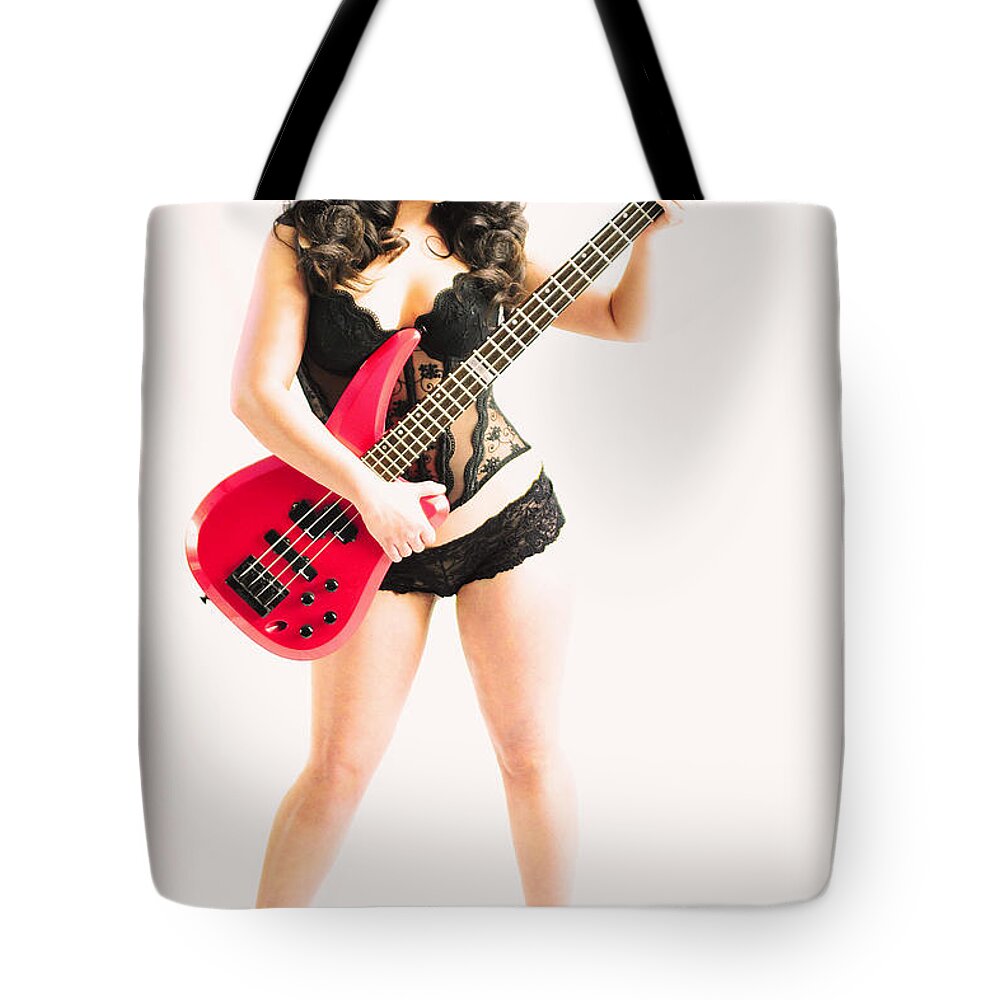 Red Tote Bag featuring the photograph Red bass guitar by Robert WK Clark