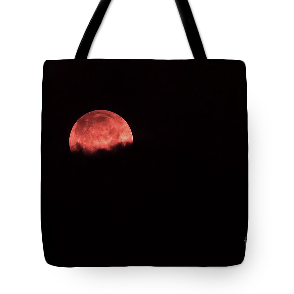 Red Tote Bag featuring the photograph Red Moon Above The Clouds by Les Palenik