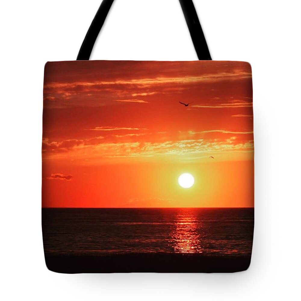 Sun Tote Bag featuring the photograph Red Skies At Night by Justin Connor