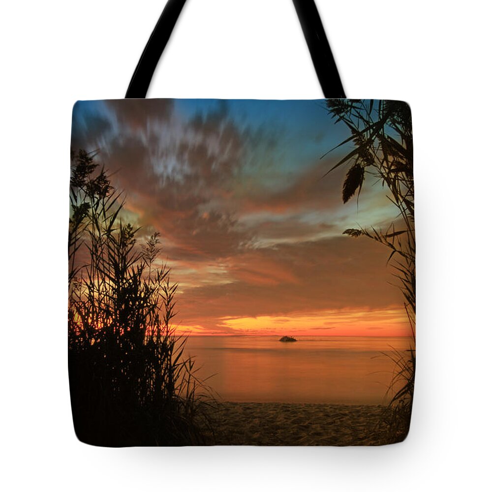 Red Tote Bag featuring the photograph Red Sunset by Darius Aniunas