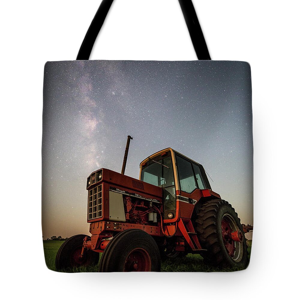 International Tote Bag featuring the photograph Red Tractor by Aaron J Groen
