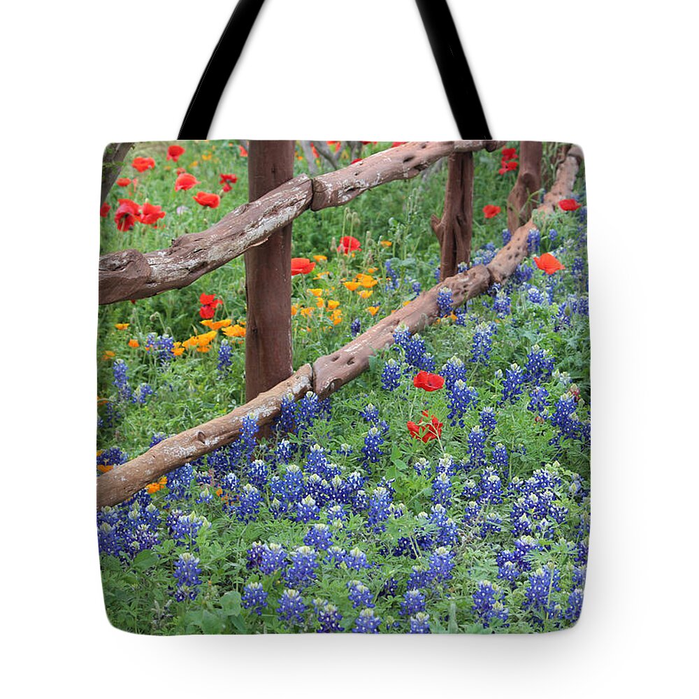 Flower And Fence Print Tote Bag featuring the photograph Red Versus Blue by Joe Pratt
