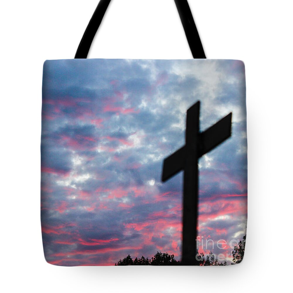 The Cross Form Set Against Turbulent Skies Reminds Us Of The Day Christ Gave It All Up For Us. Tote Bag featuring the photograph Reminded by Robin Coaker